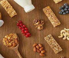 Упаквощицы сидя склад чая батончиков